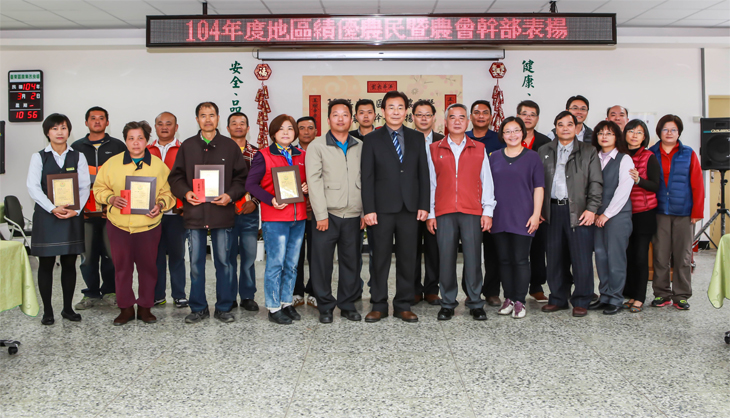 Group photo of Director Chen, award winners, and all others present.
